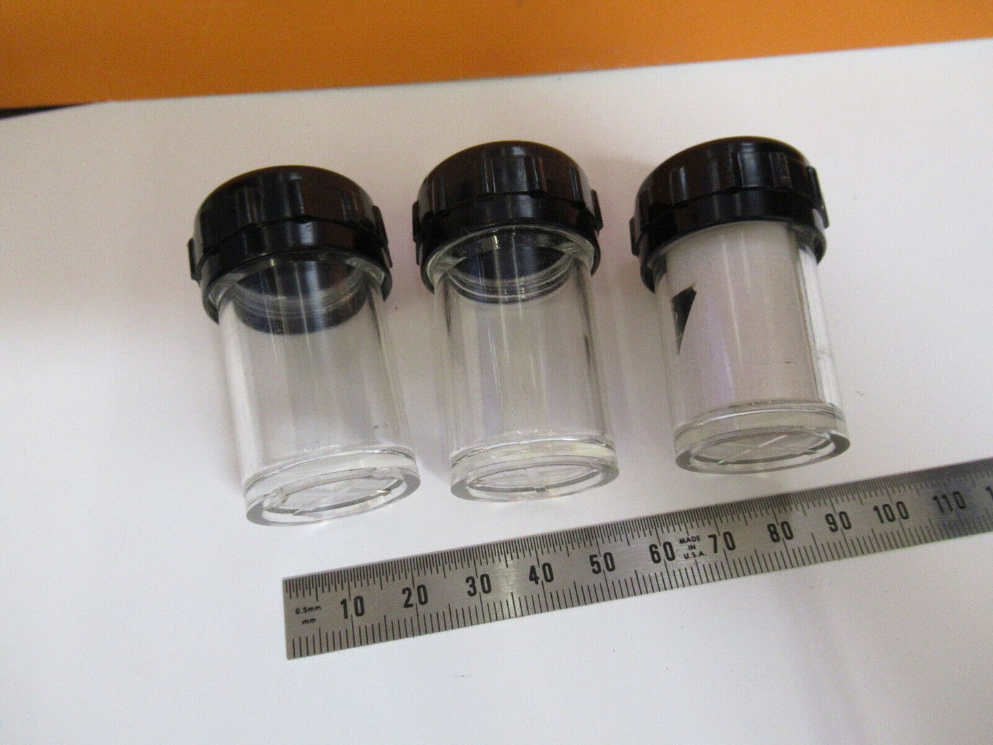 EMPTY PLASTIC CANISTERS LOT BAUSCH LOMB MICROSCOPE PART AS PICTURED Y2-A-14