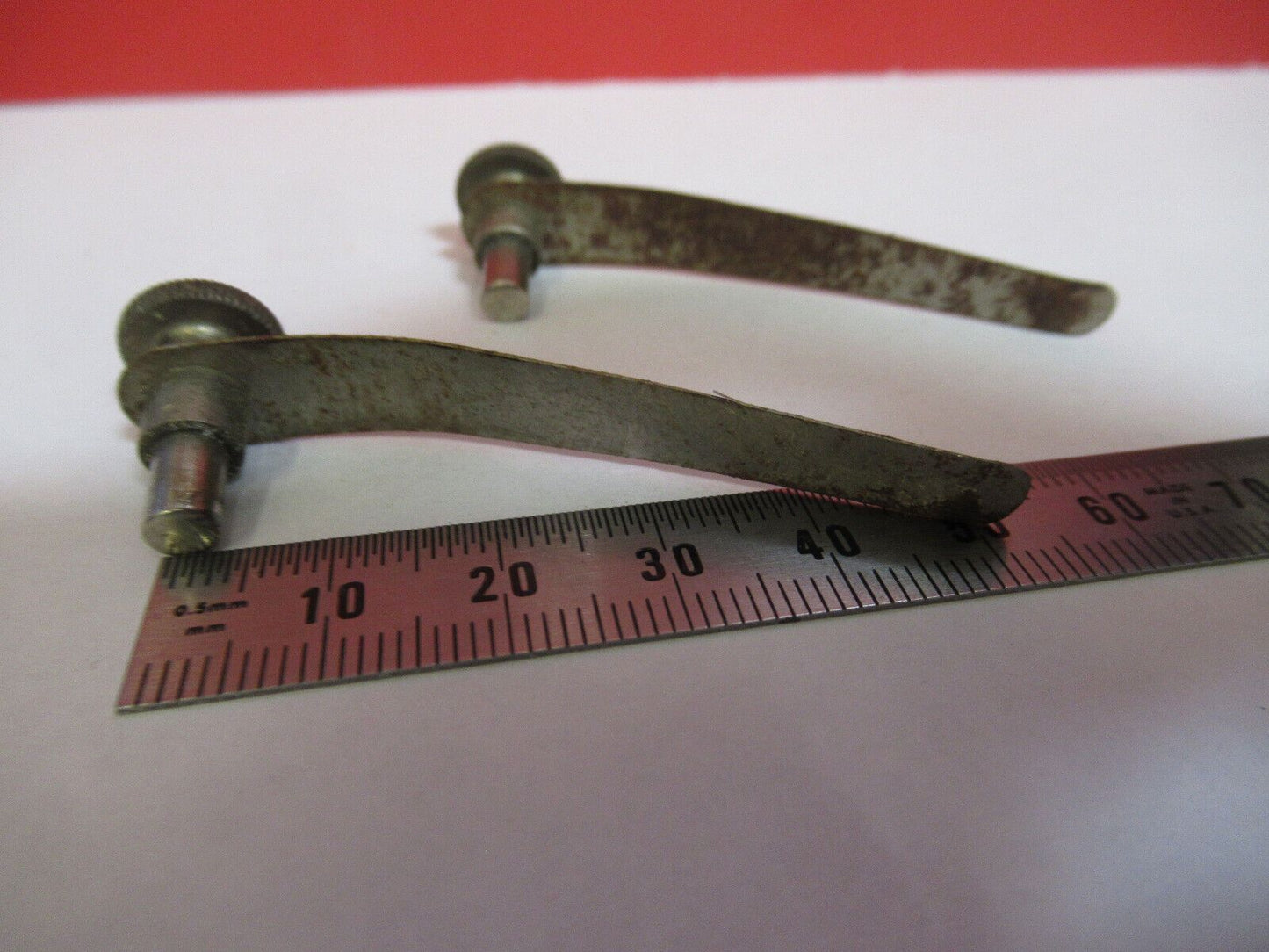 ANTIQUE AMERICAN OPTICS PAIR of CLIPS rusty MICROSCOPE PART AS PICTURED S6-A-47