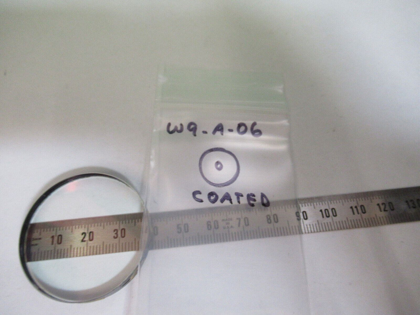 OPTICAL COATED LENS hole in center MIL SPEC OPTICS AS PICTURED #W9-A-06